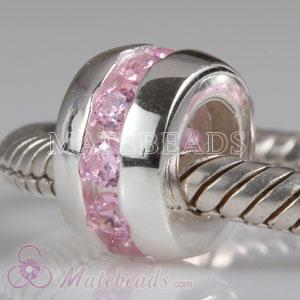 Sterling silver bead with pink stones