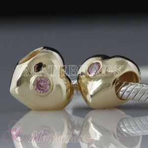 Gold plated silver heart bead with pink stones