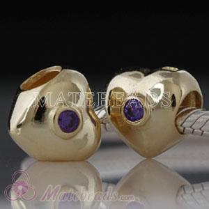 Gold plated silver heart bead with purple stones