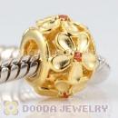 Gold plated sterling silver Daisy charm Beads with orange Stone